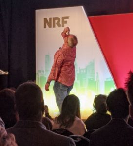 Hello Products’ CEO Craig Dubitsky eats a bottle of his brand’s toothpaste on stage at NRF 2020.