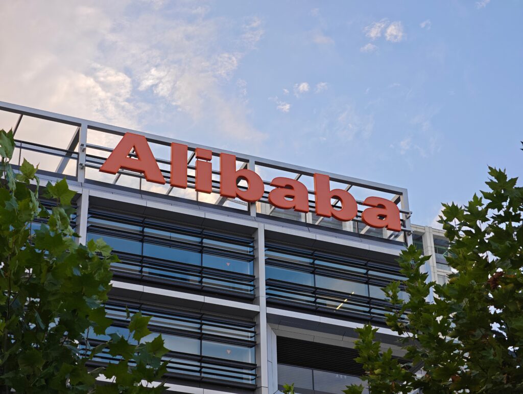 Alibaba reported revenue growth but sharply lower profit in its fiscal Q3, as spending on AI and rapid delivery services weighed on results. | Image credit: Robert - Adobe Stock