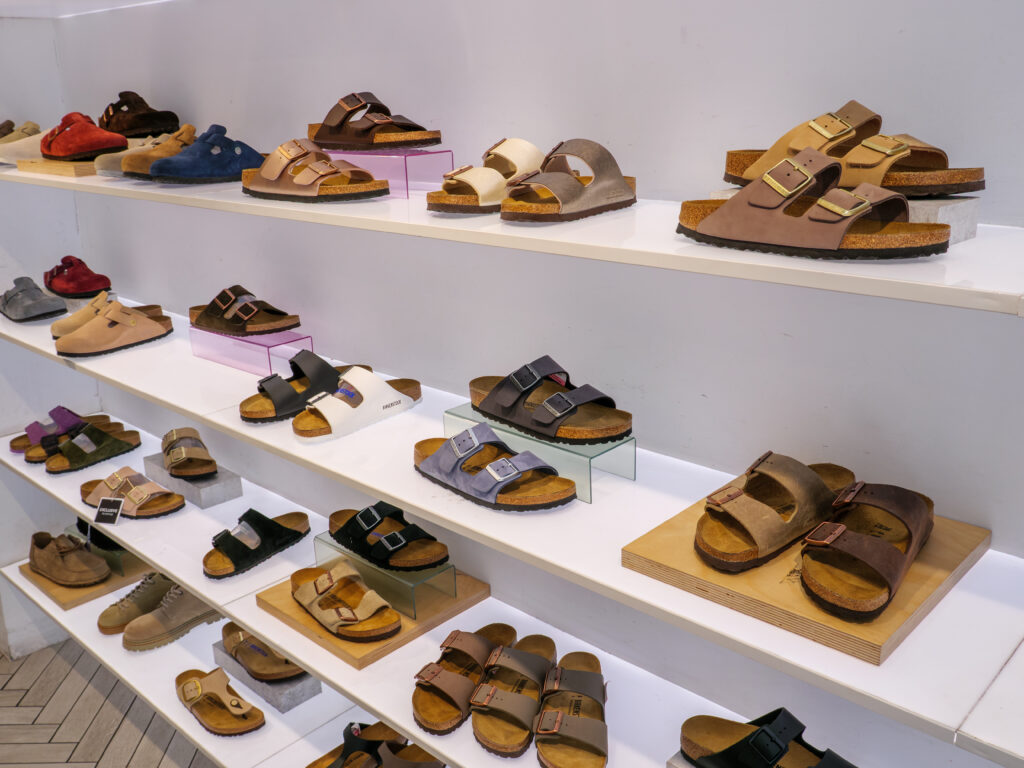 The ecommerce earnings recap of online retailers in North America who reported this past week: Birkenstock, On, Tapestry and Yeti. | Image credit: Alex Segre - Adobe Stock