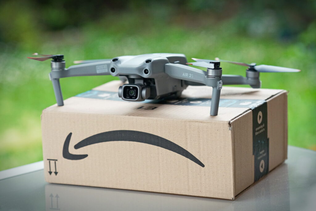 Amazon.com Inc. is expanding its Prime Air drone delivery to five more U.S. metro areas, the online retail giant announced. | Image credit: Mike Dot - Adobe Stock